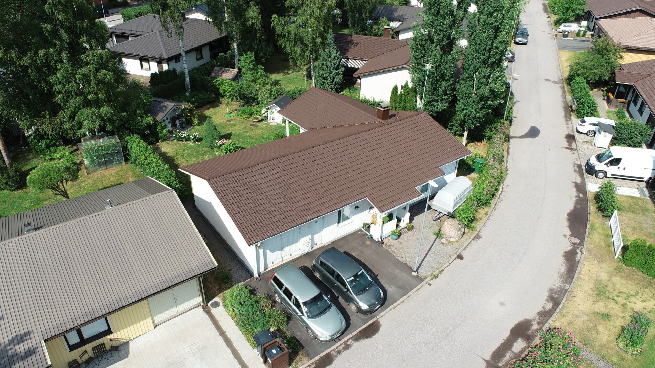 Tiilikaton pesu ja pinnoitus